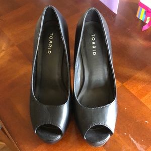 Ladies black Torrid heals, size 8. Never worn!